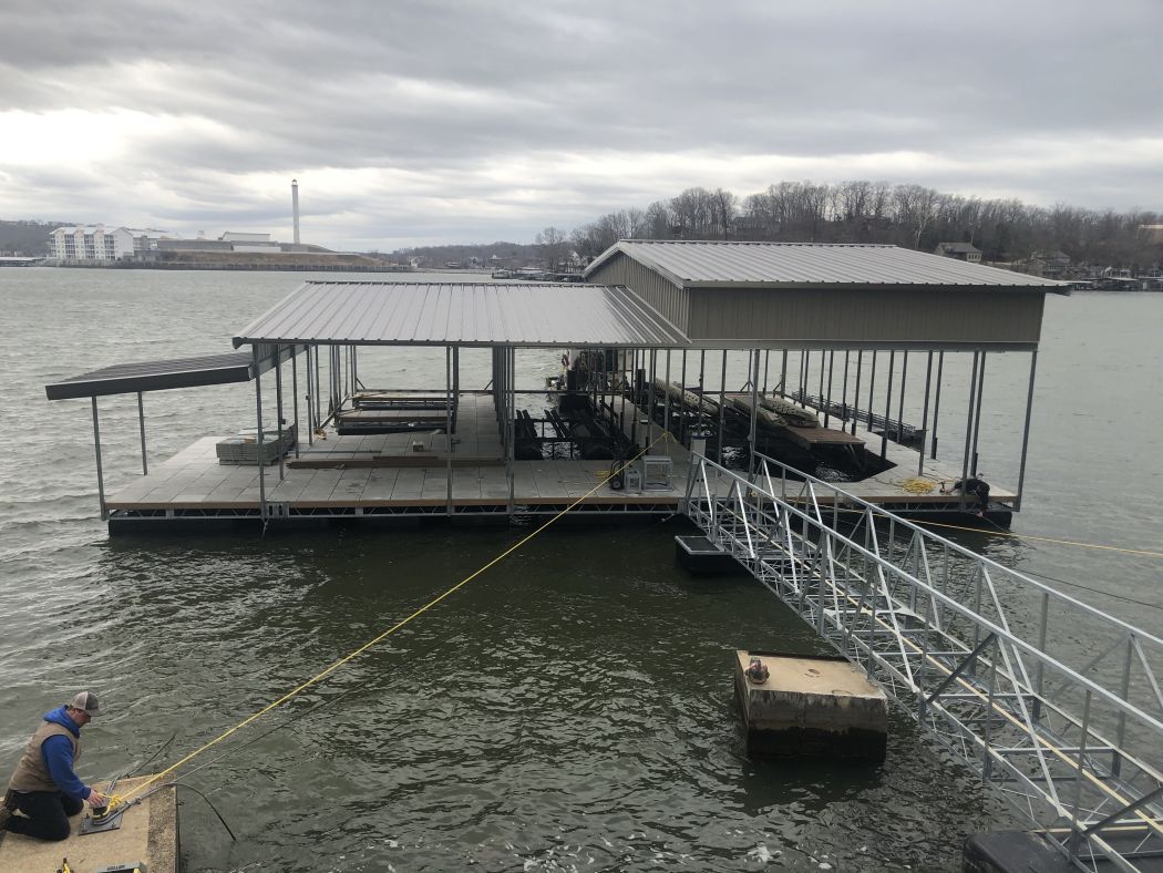 Custom 2 Slip Boat Dock with Roof Skirting and Swim Deck