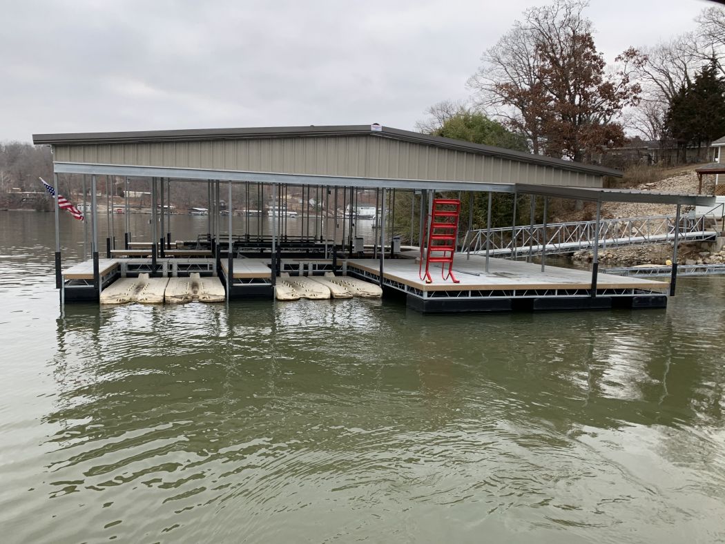 Custom 2 Slip Boat Dock with Roof Skirting and Swim Deck